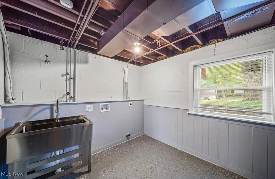 Laundry area featuring hookup for a washing machine and hookup for an electric dryer
