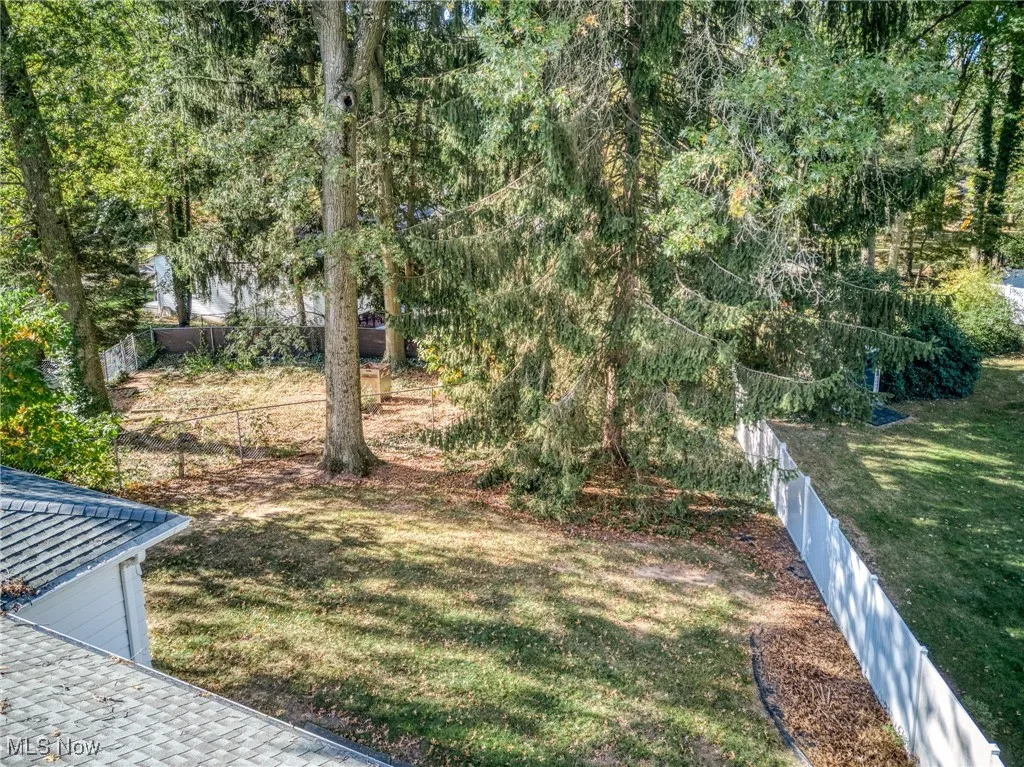 View of fenced backyard