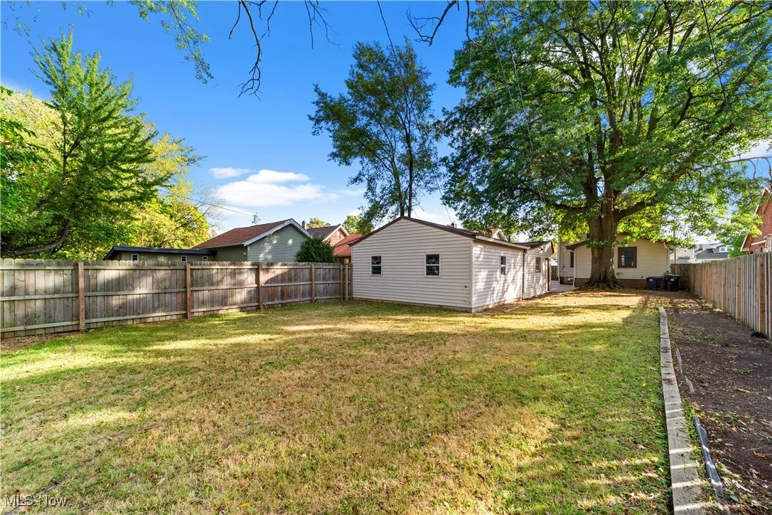 View of fenced backyard
