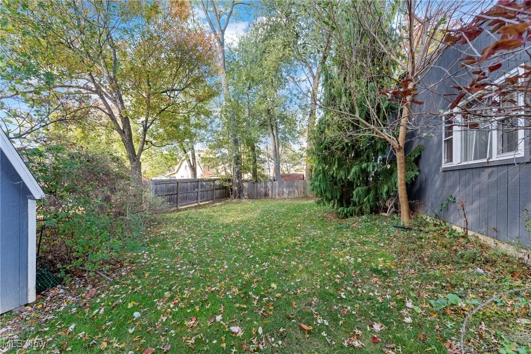 View of fenced backyard