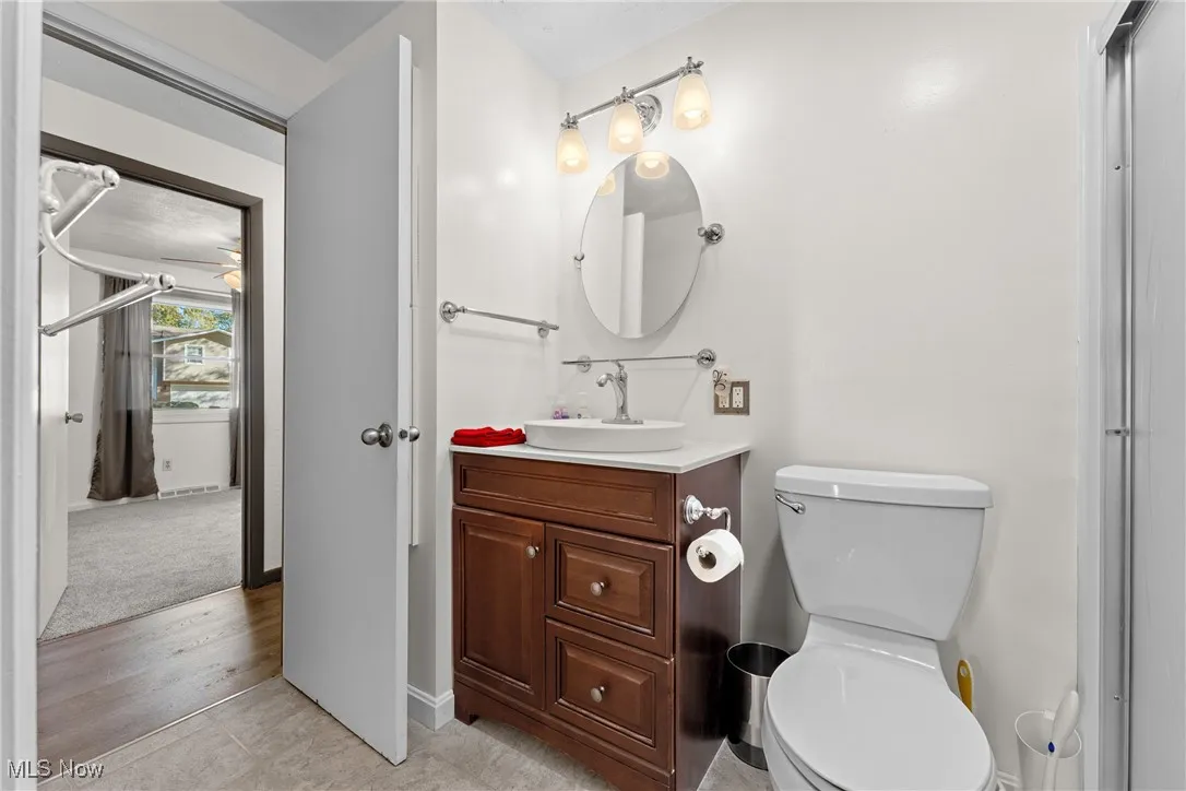 Bathroom featuring vanity and light tile patterned floors