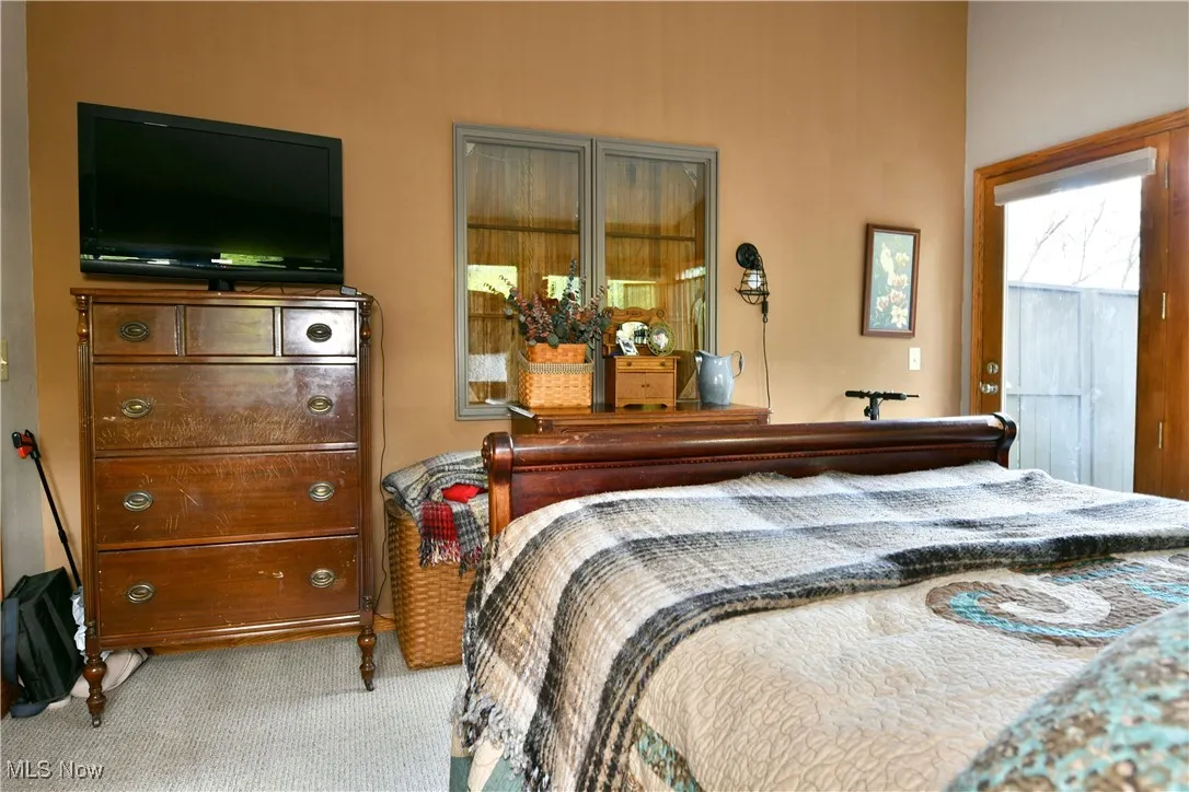 Bedroom featuring carpet flooring