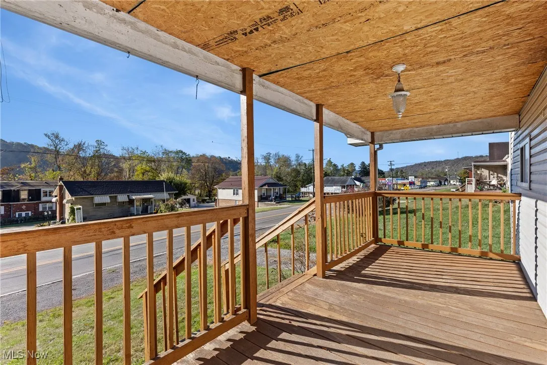 Porch with a yard and a residential view