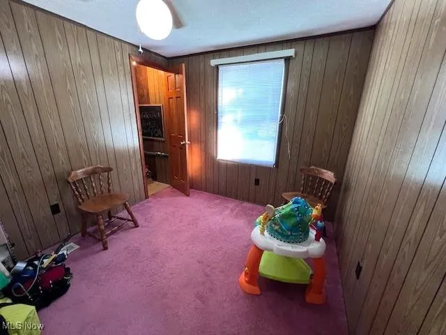Bedroom that was used a home office with extra storage room on back wall area.