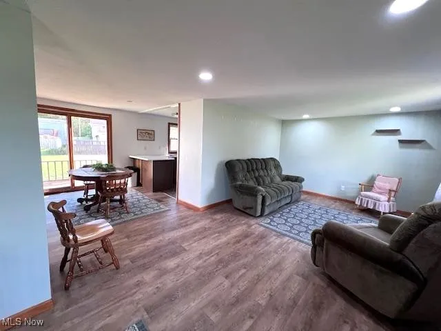 Living area showing floor plan open living areas. LR, Dining and Kitchen.
