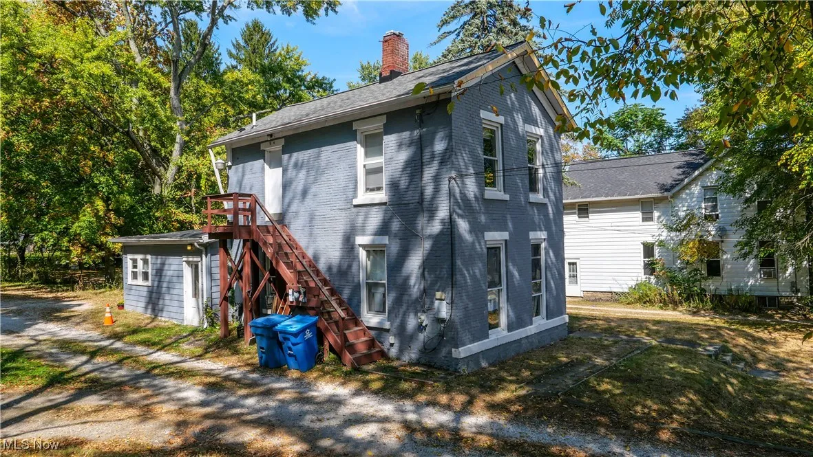 View of outdoor structure featuring stairs