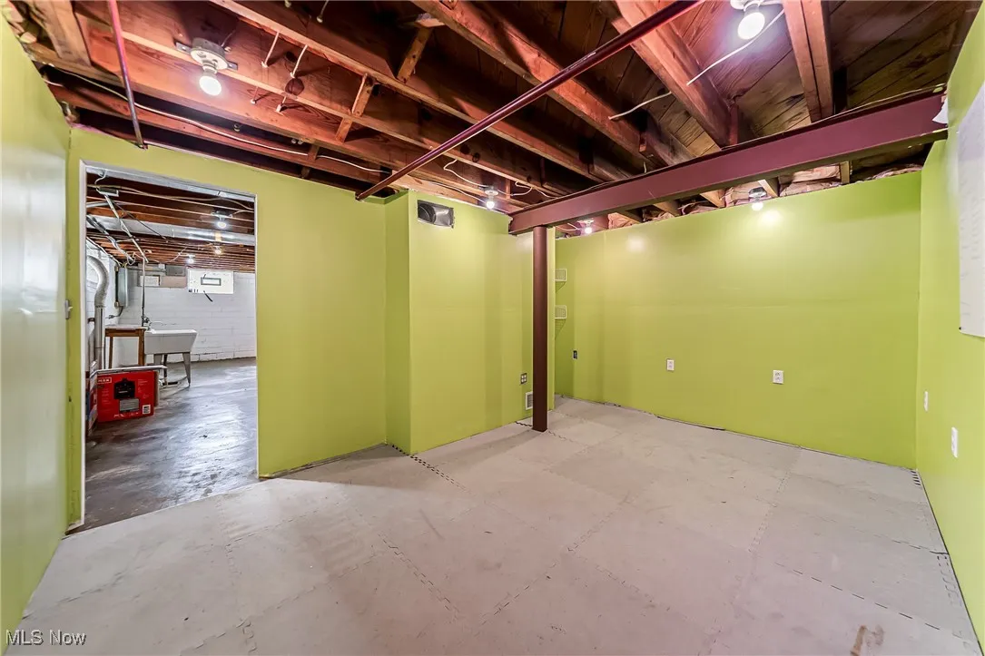 Basement featuring a sink