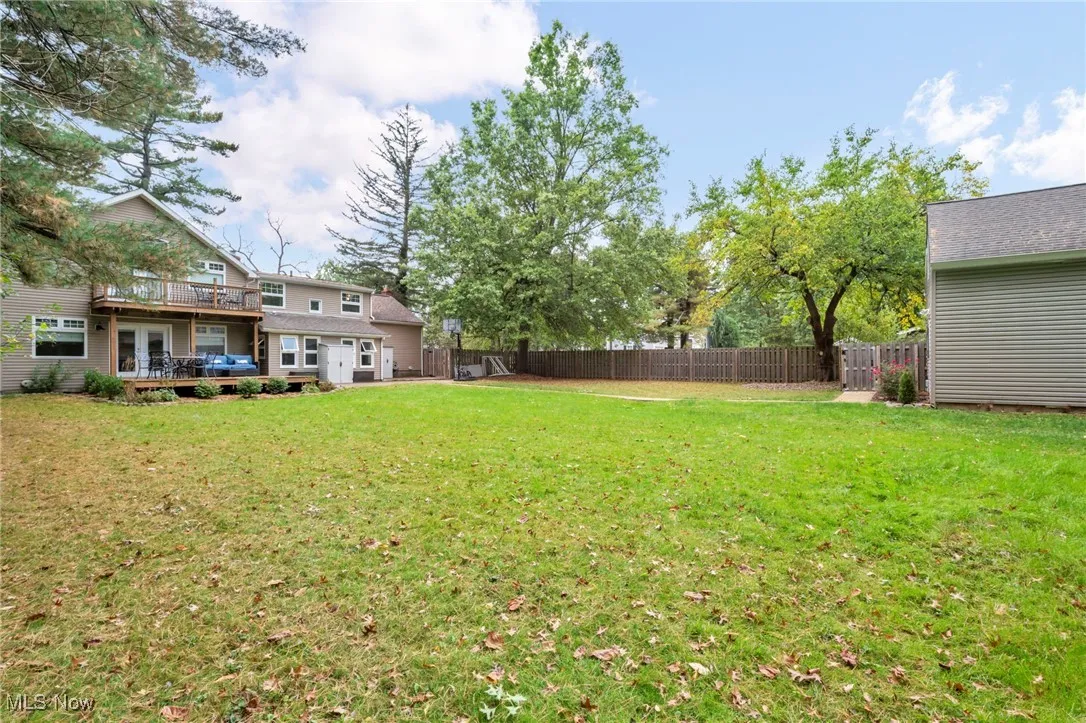View of fenced backyard