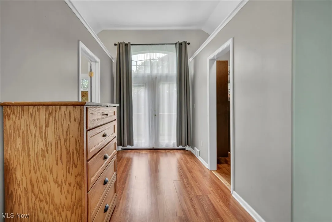 French doors lead to balcony