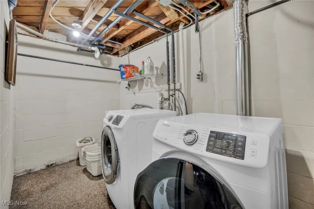 Laundry room with independent washer, dryer and mop sink