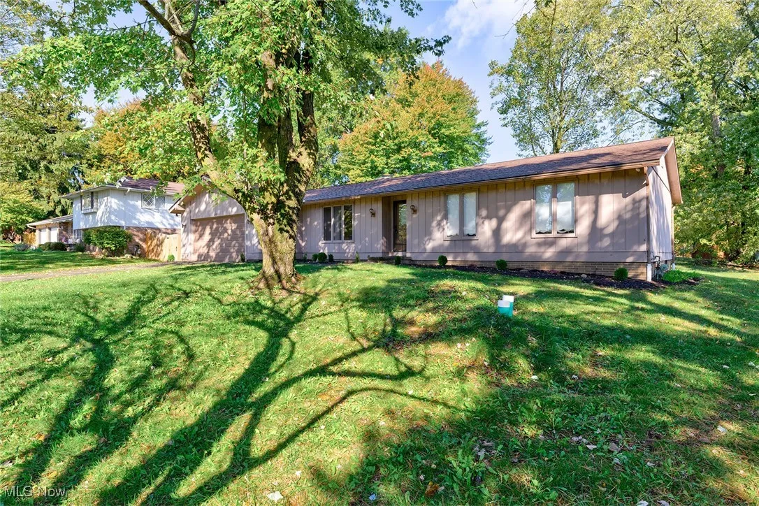 View of front of house with a front lawn