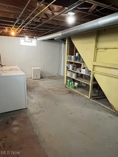 Below grade area featuring washer / clothes dryer