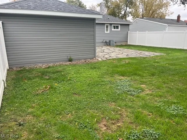 View of yard with a patio area