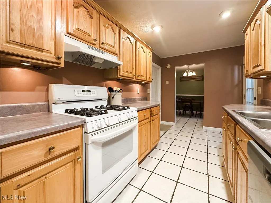 lots of cabinets and countertop ...