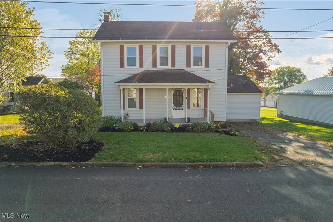 View of front of home featuring covered porch