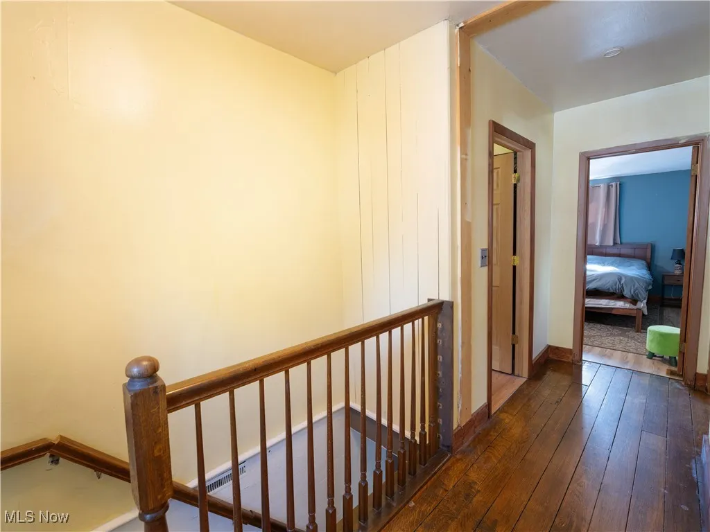 upstairs Hall with wood finished floors