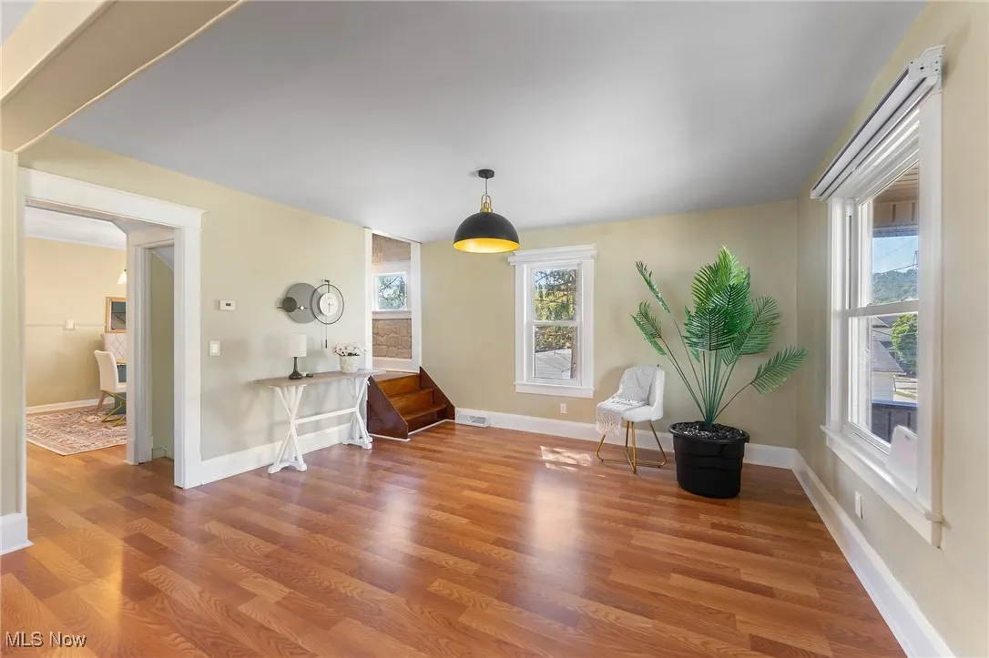 Sitting room with wood finished floors