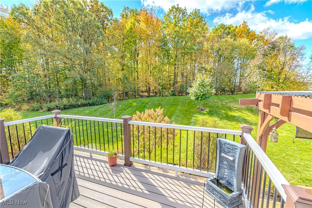 Deck featuring a yard