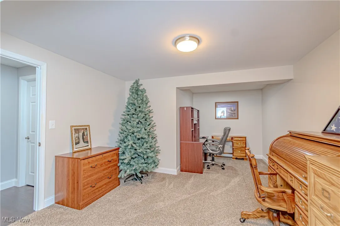 Office area with carpet flooring