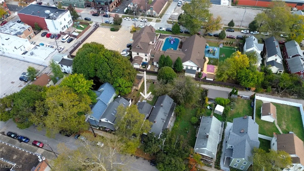 Aerial overview of property's location with nearby suburban area