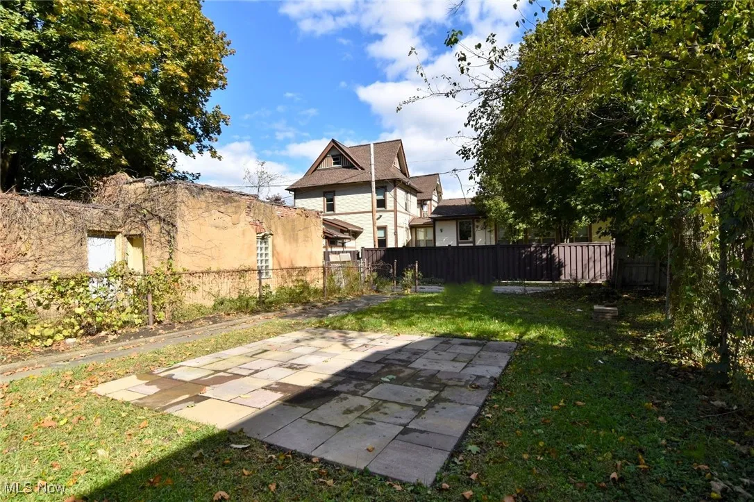 Fenced backyard featuring a patio area