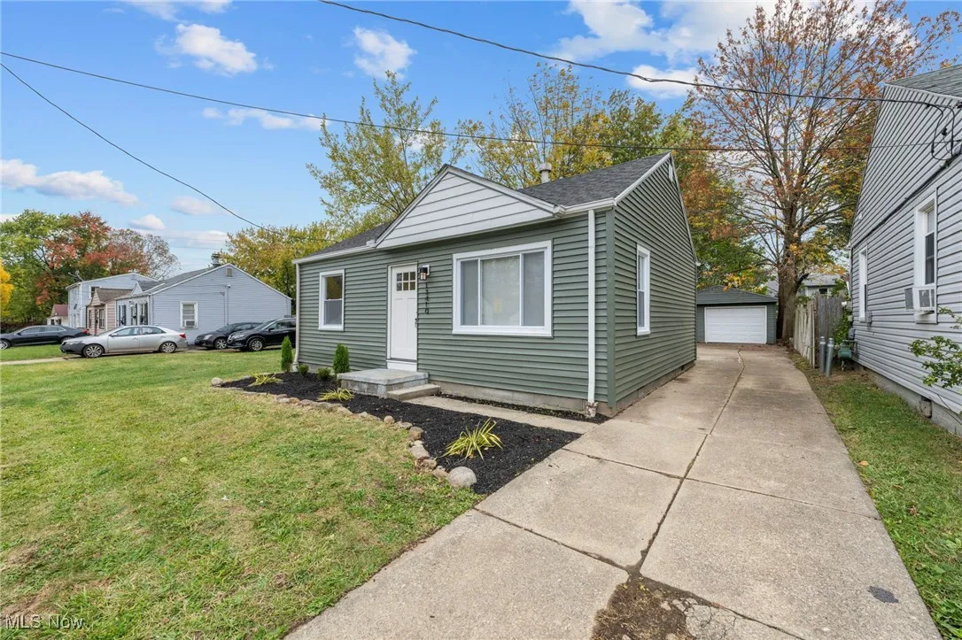 View of front of home featuring a front lawn