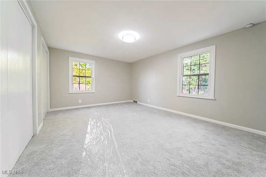 Unfurnished room featuring carpet floors