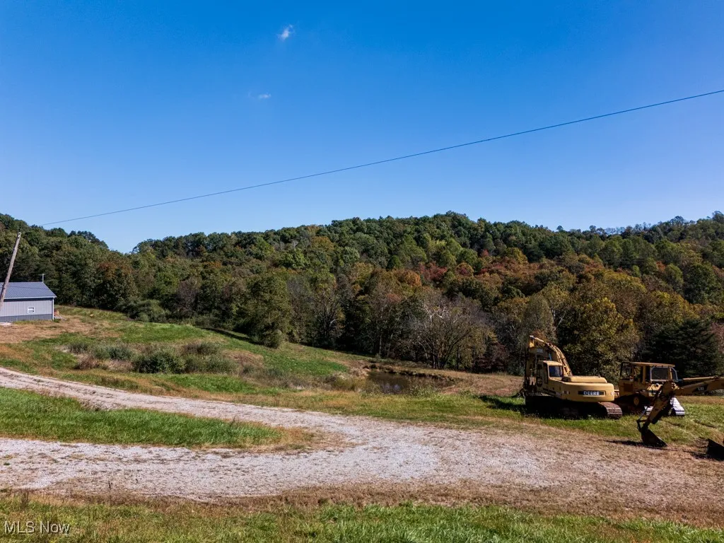 View of yard with a forest view