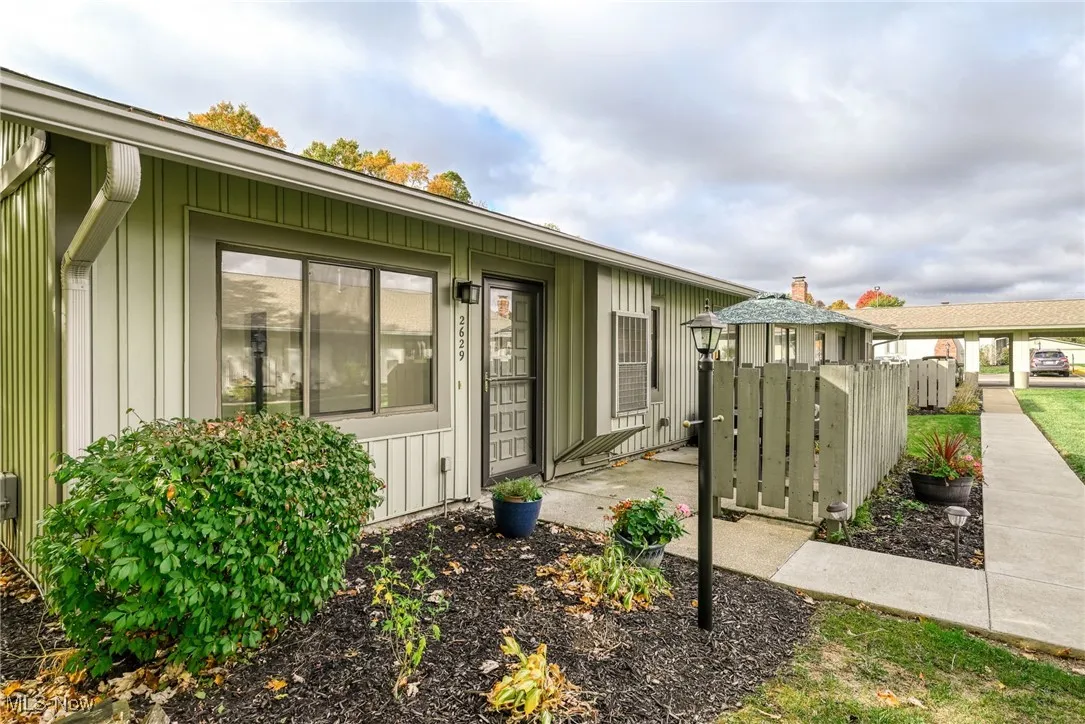 Property entrance with board and batten siding