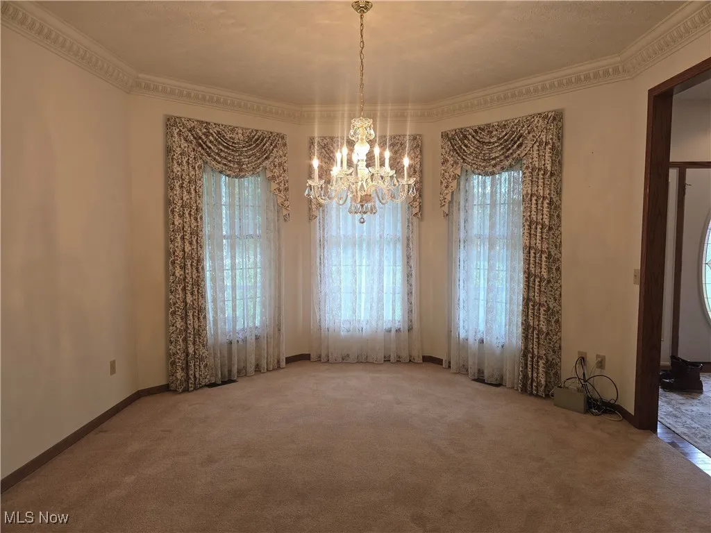 Formal dining room with chandelier