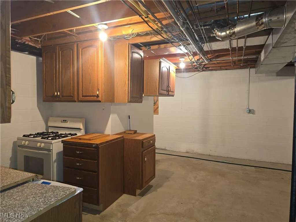 Kitchenette in lower level, perfect for canning or extra prep space.