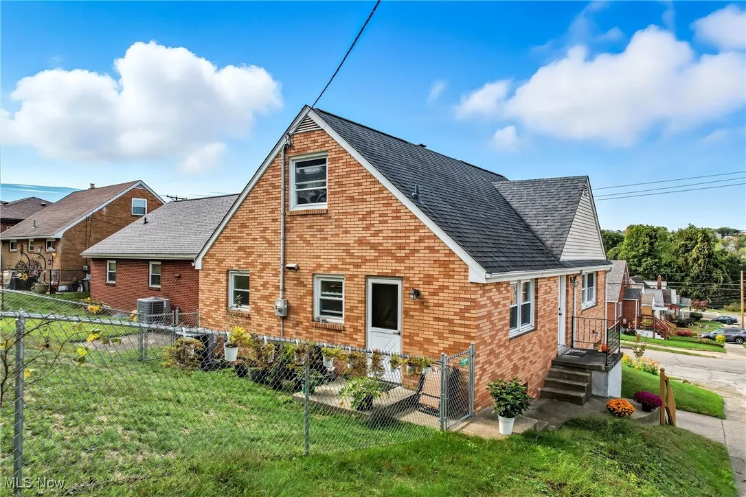 Fenced backyard awaits your pets and/or kiddos