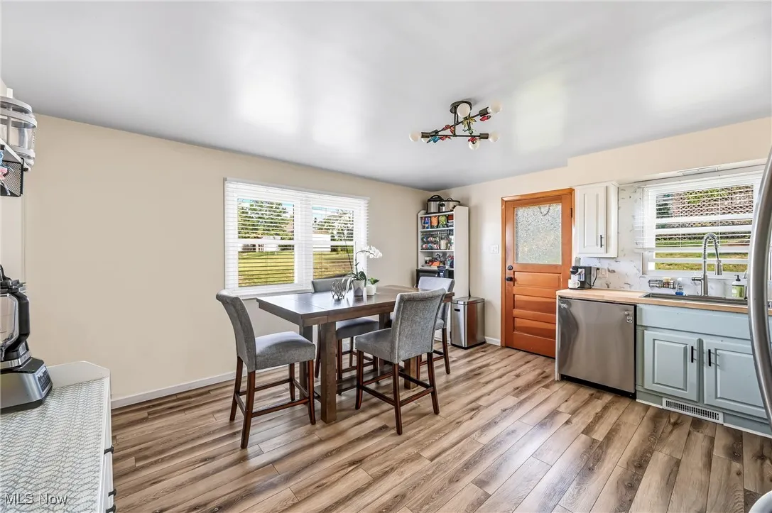 New butcher block style countertops, new sink & faucet.