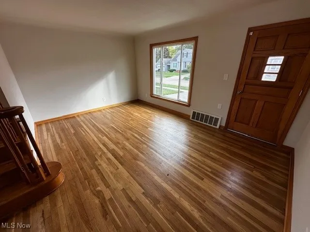 Foyer featuring hardwood / wood-style floors