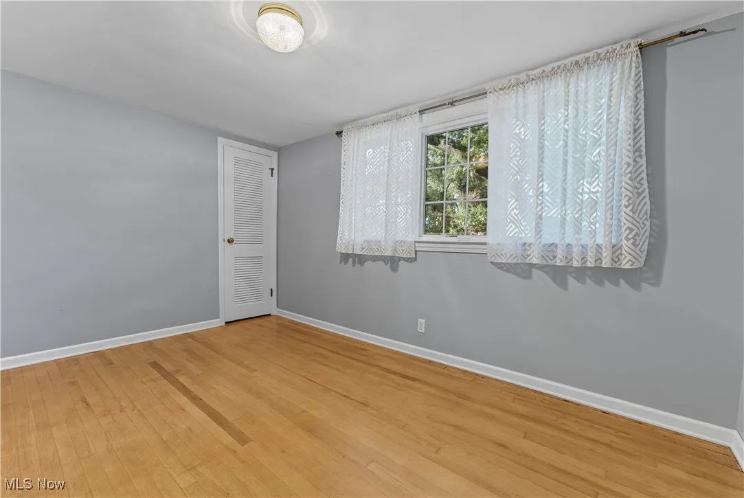Spare room featuring light wood finished floors