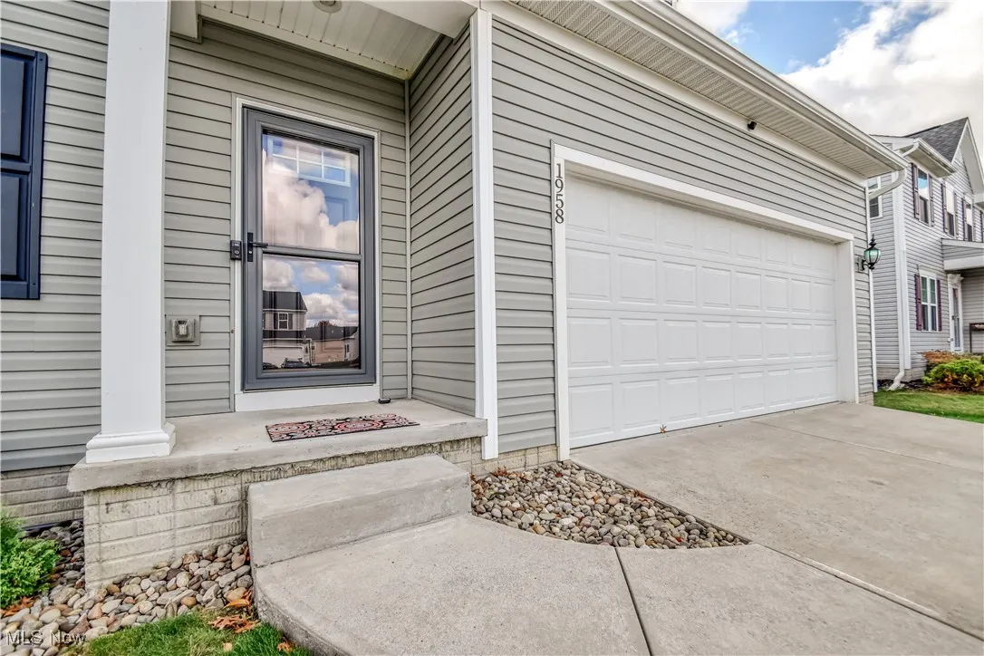 Doorway to property with driveway