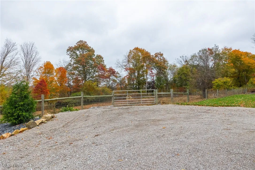 View of yard with a gate