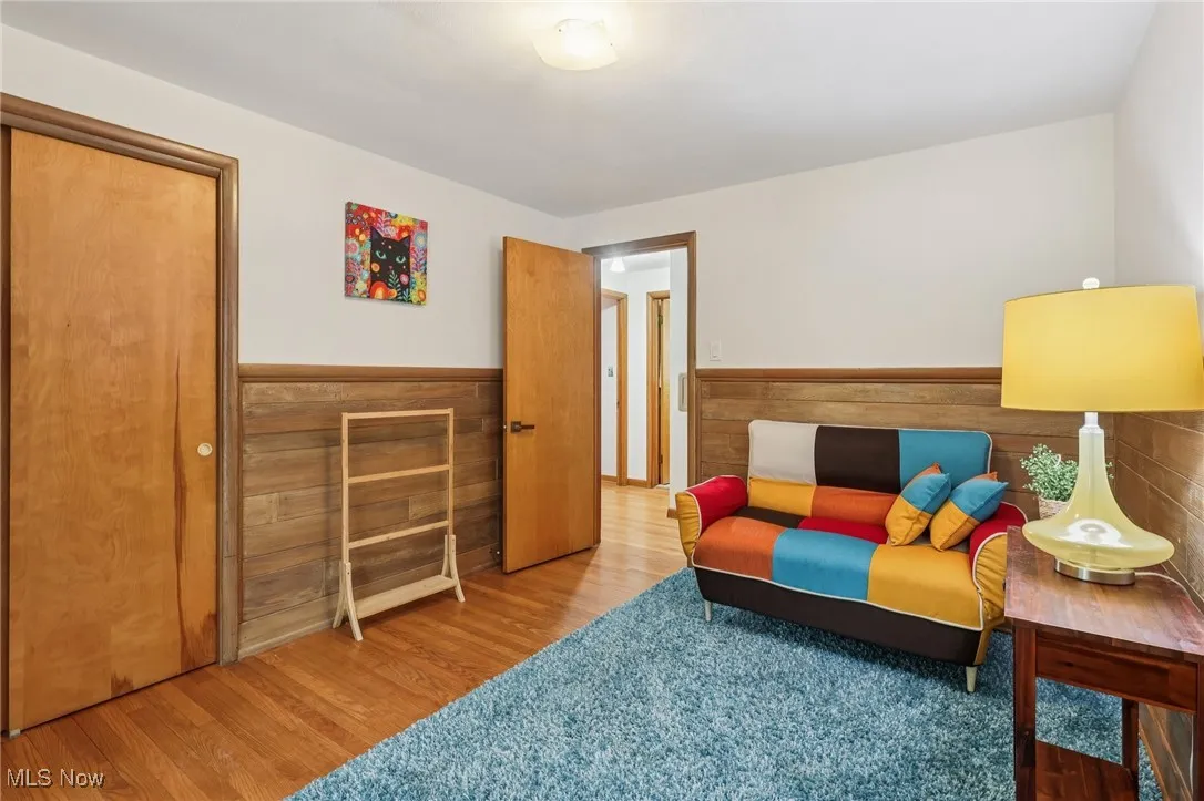 The Third Bedroom with hardwood floor and double closet