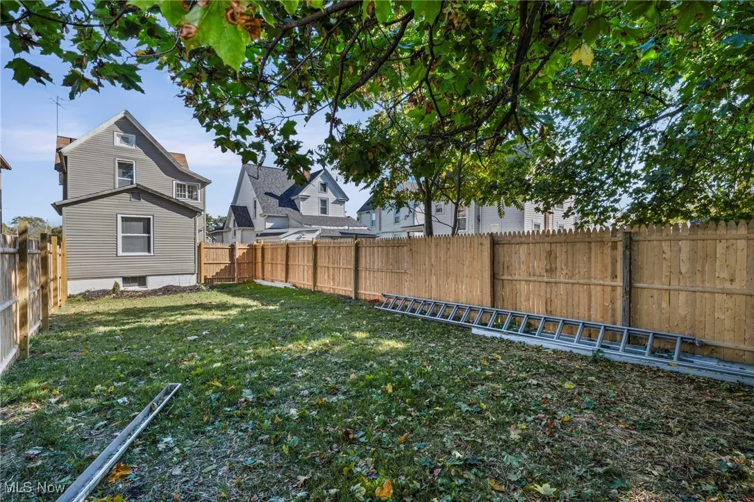 View of fenced backyard