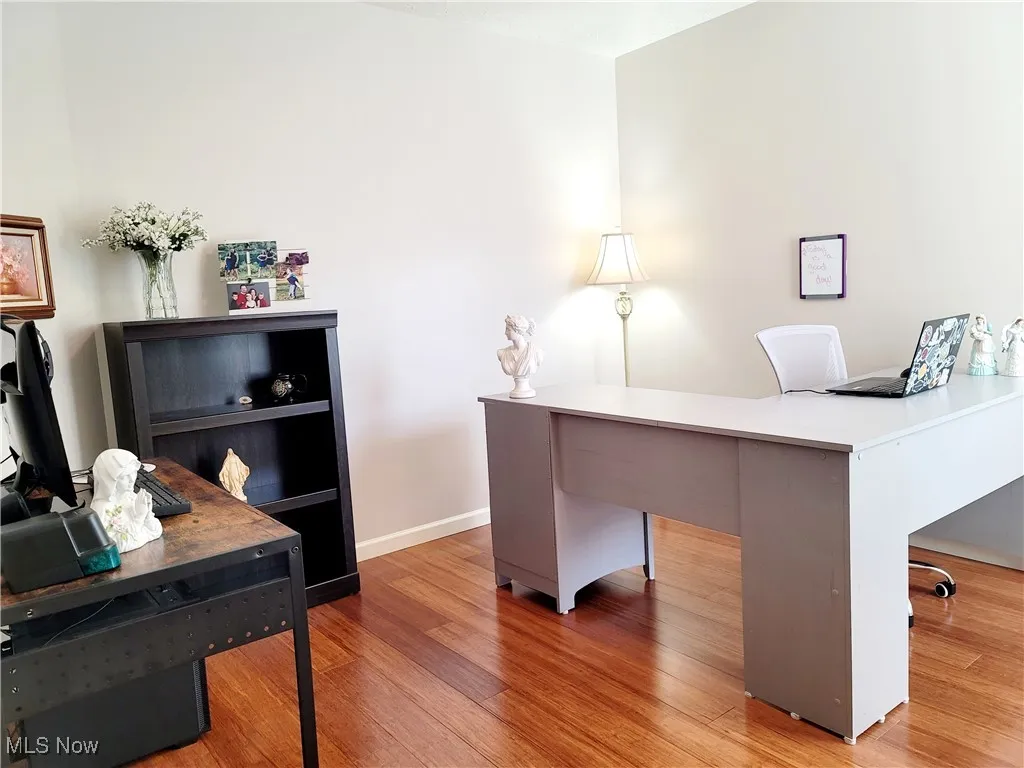 Office space with light wood-type flooring
