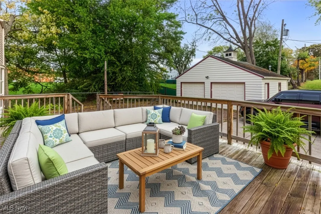 How would you decorate this large outdoor living space? (furniture staged with AI)
