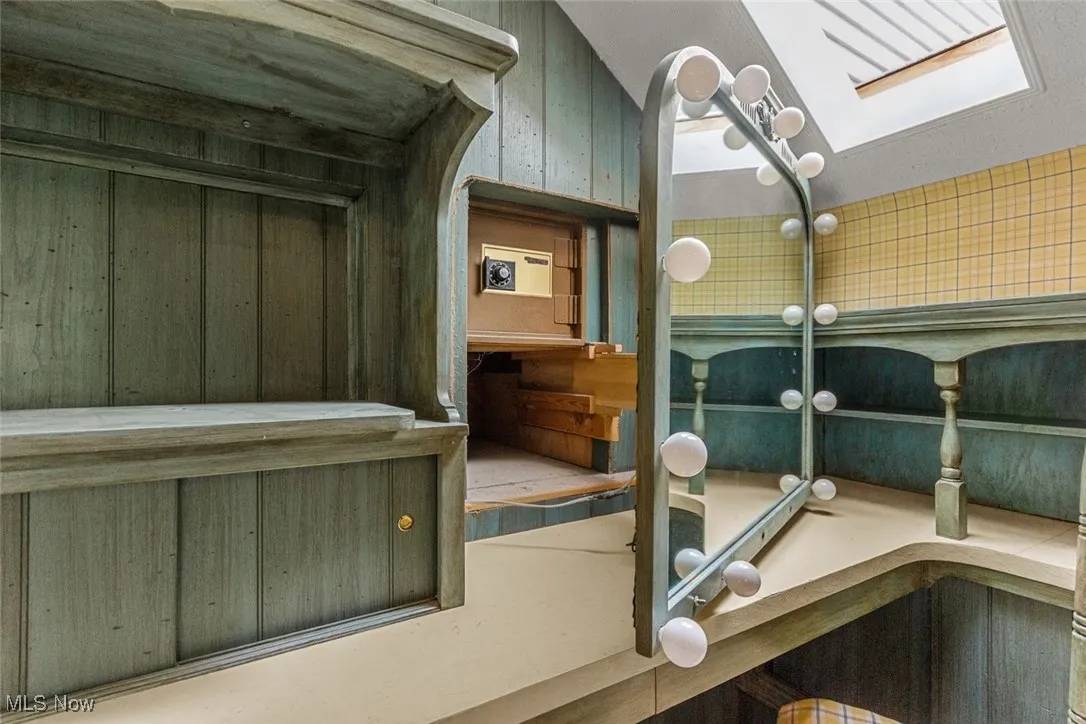 So many built-ins in this bedroom - including this hidden safe behind the built in vanity!