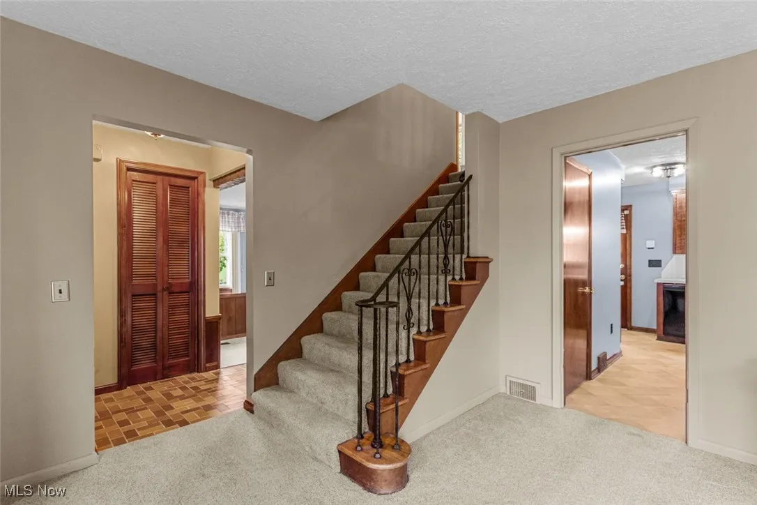 Foyer entry leads to formal living room or bonus family room. Large wide staircase leads to 2nd floor with 4 bedrooms and bath.