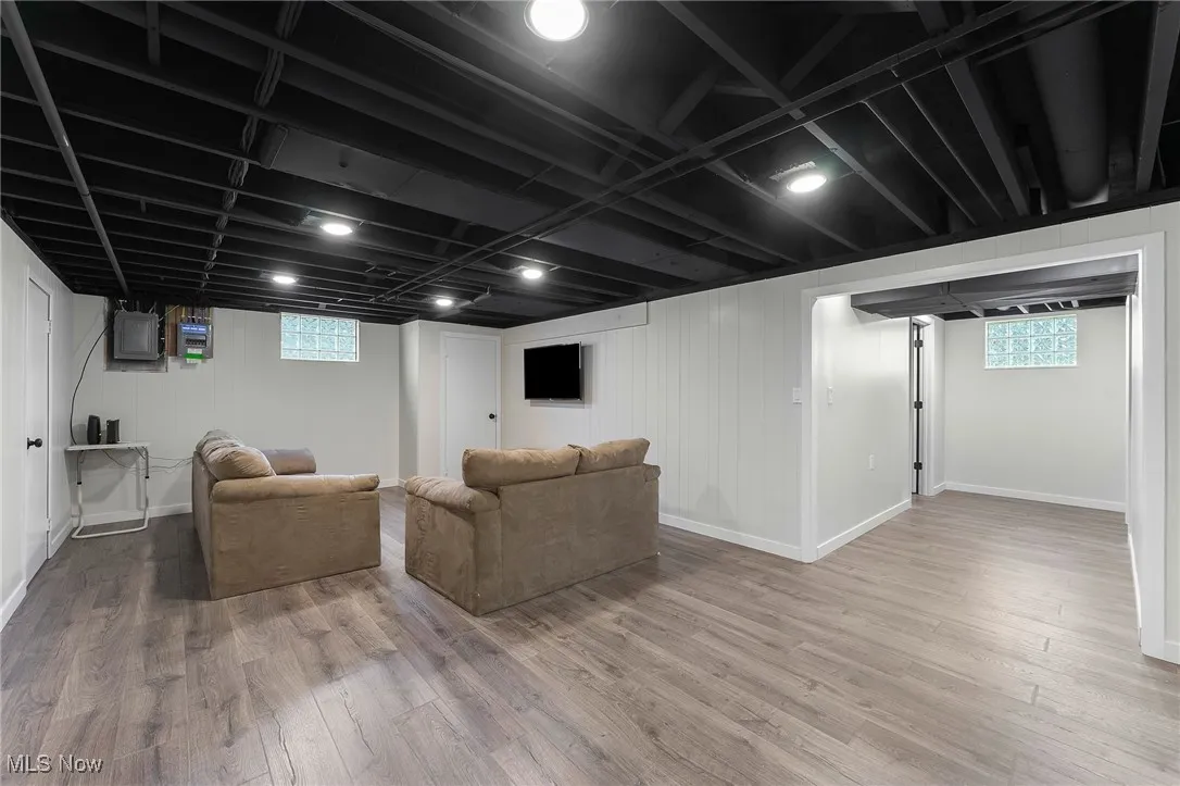Family room featuring wood finished floors and electric panel