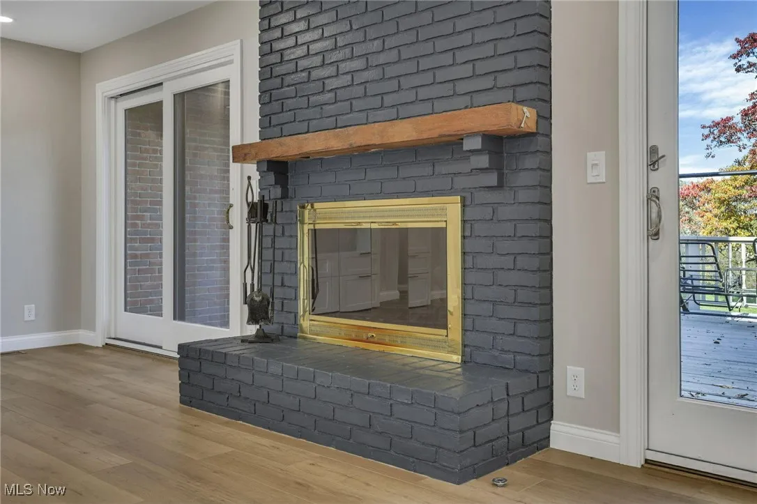 Detailed view of wood finished floors and baseboards