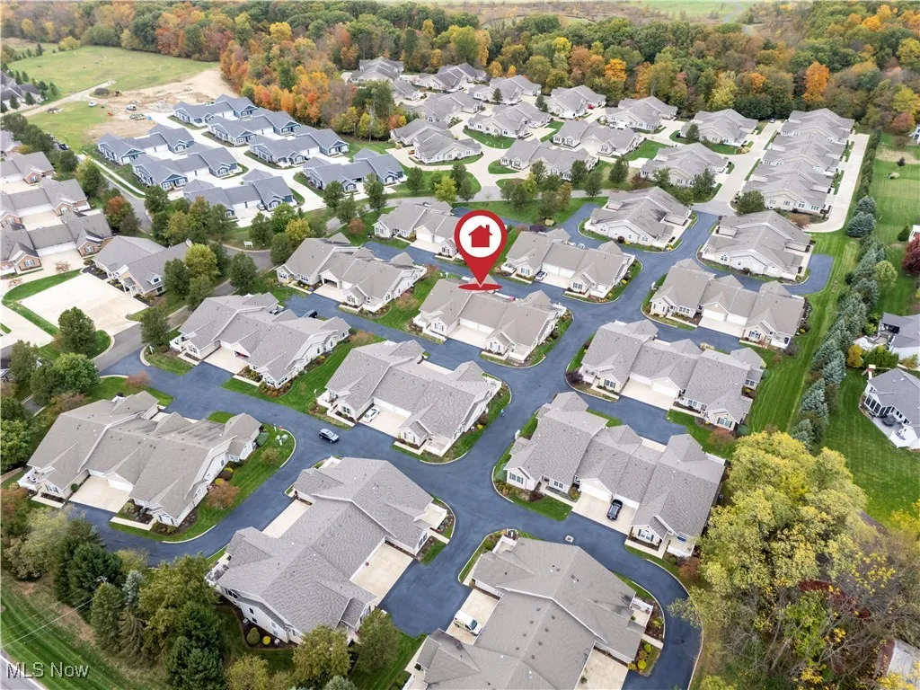 View of property location with nearby suburban area