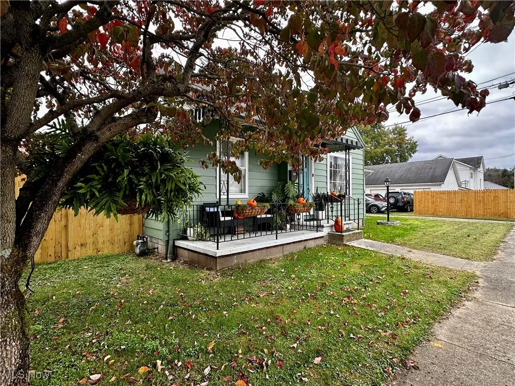 View of yard and front porch