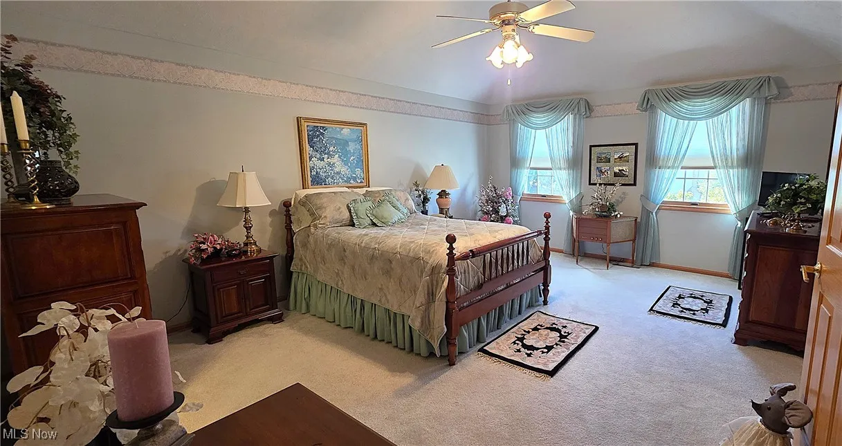Large Master Bedroom with a vaulted ceiling, full bath and huge walk-in closet.