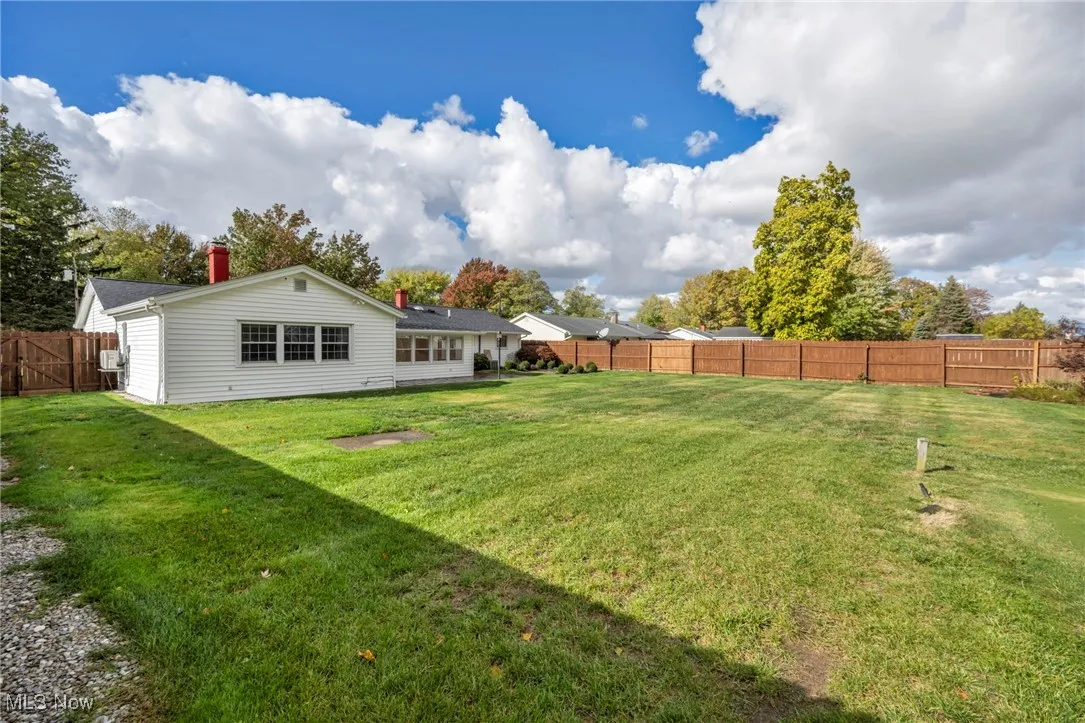 View of fenced backyard