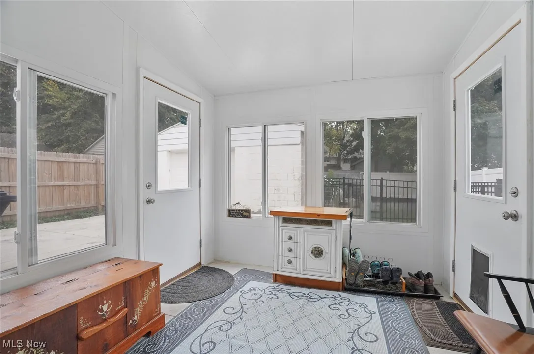 Stunning mud room is an addition the owners installed off the kitchen on the back of the house. Airy and bright and overlooks the back yard.